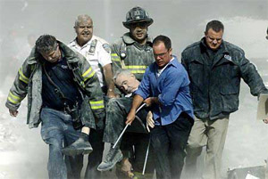 Firemen work to rescue victims of terrorist attack